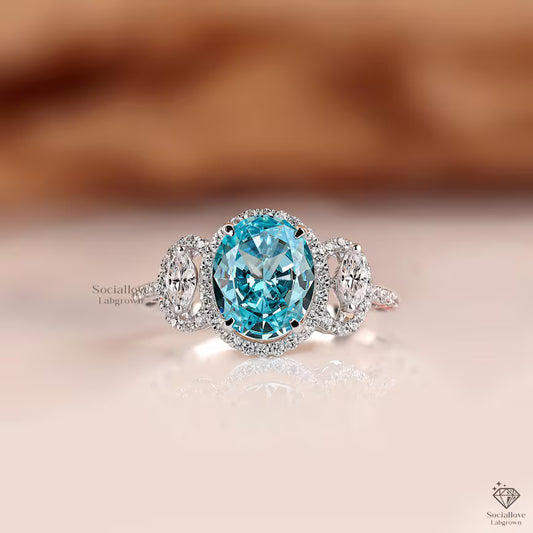 Oval Blue Lab Grown Diamond Engagement Ring | Side Marquise Halo Trilogy Ring in 14K Gold | IGI Certified Anniversary Gift for her.
