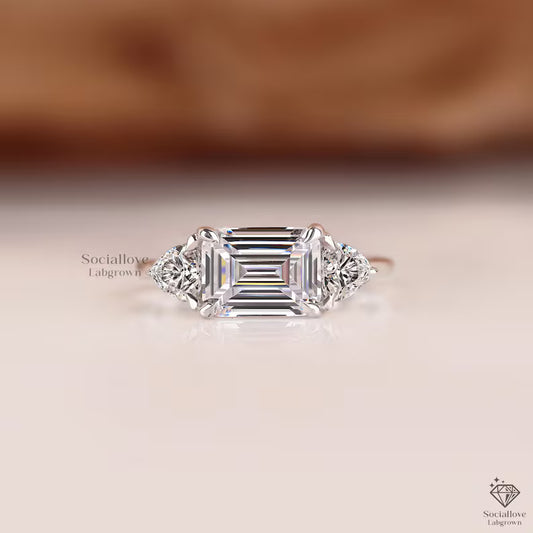 East West Emerald Cut Lab Diamond Engagement Ring Three Stone Trilogy Ring Trillion Side Diamonds 14K Gold Anniversary Gift Modern Bridal Jewelry.
